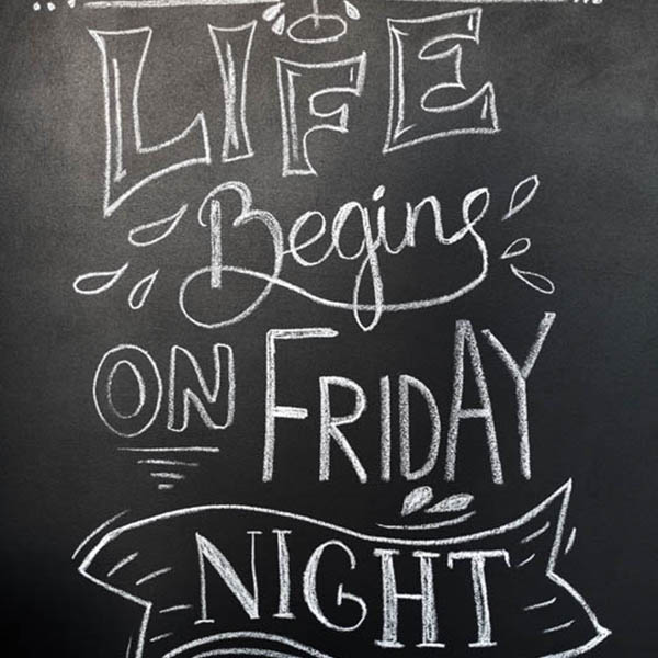 Chalk hand-drawn lettering. Life begins on friday night, inscription for prints and posters, menu design, invitation and greeting cards. Fun quote about friday and weekend, office motivation quote.